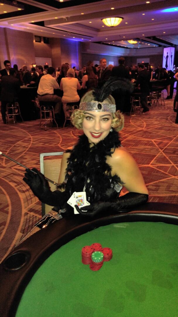 A Woman in flapper outfit at casino party.